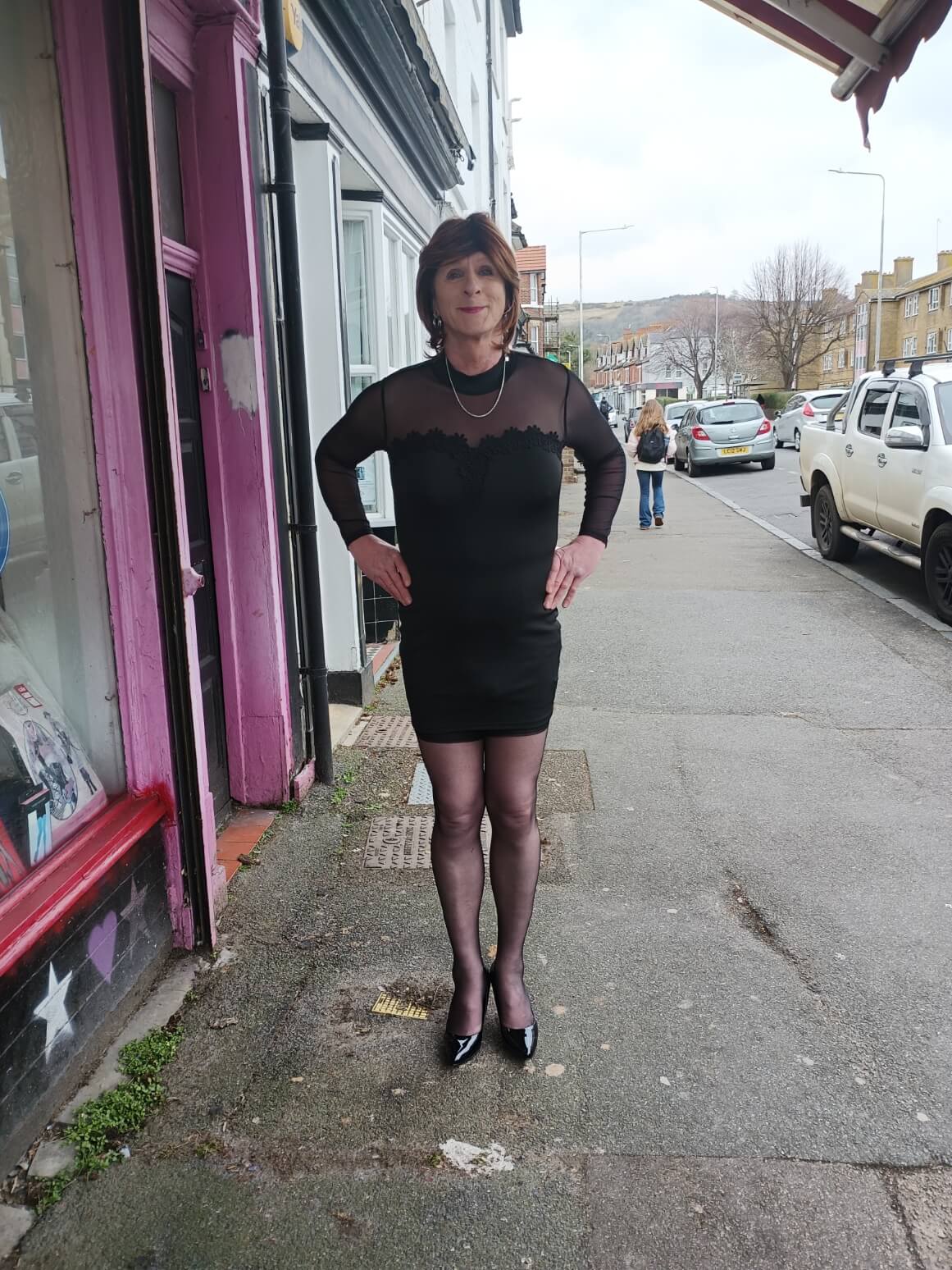 christine-outside-wearing-black-stretchy-dress