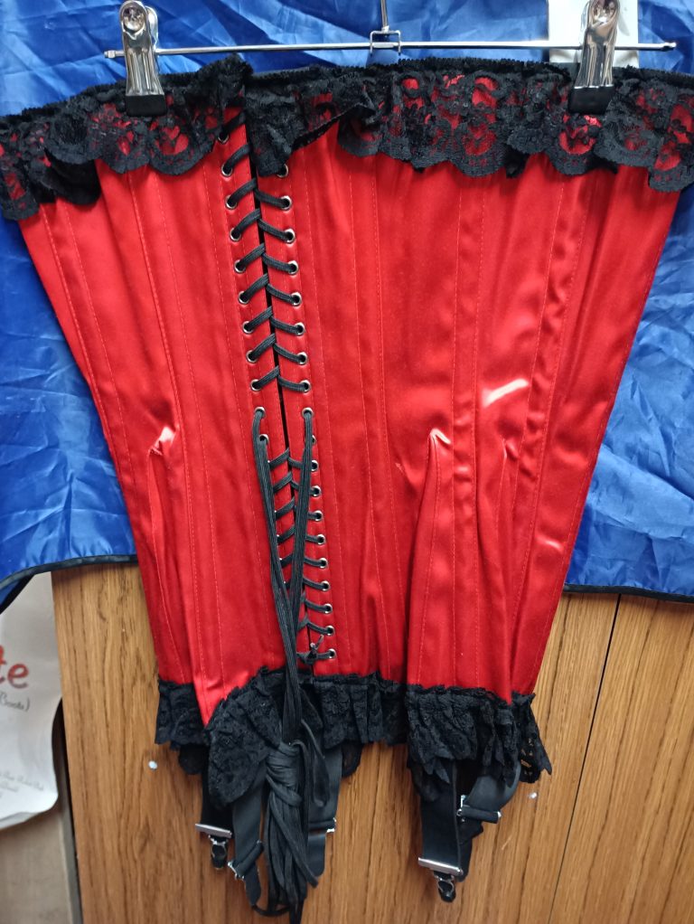 C140 Axfords Lonmg Coset red with black lace 26 inches