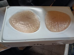 Transform Premier Triangle Silicone Breast Form – Size 4 Rear View in Original Packaging